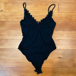 Free People Black Bodysuit - Size Medium - Seamless Stretch - Layering Essential